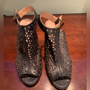 Black booties with stylish cut-outs